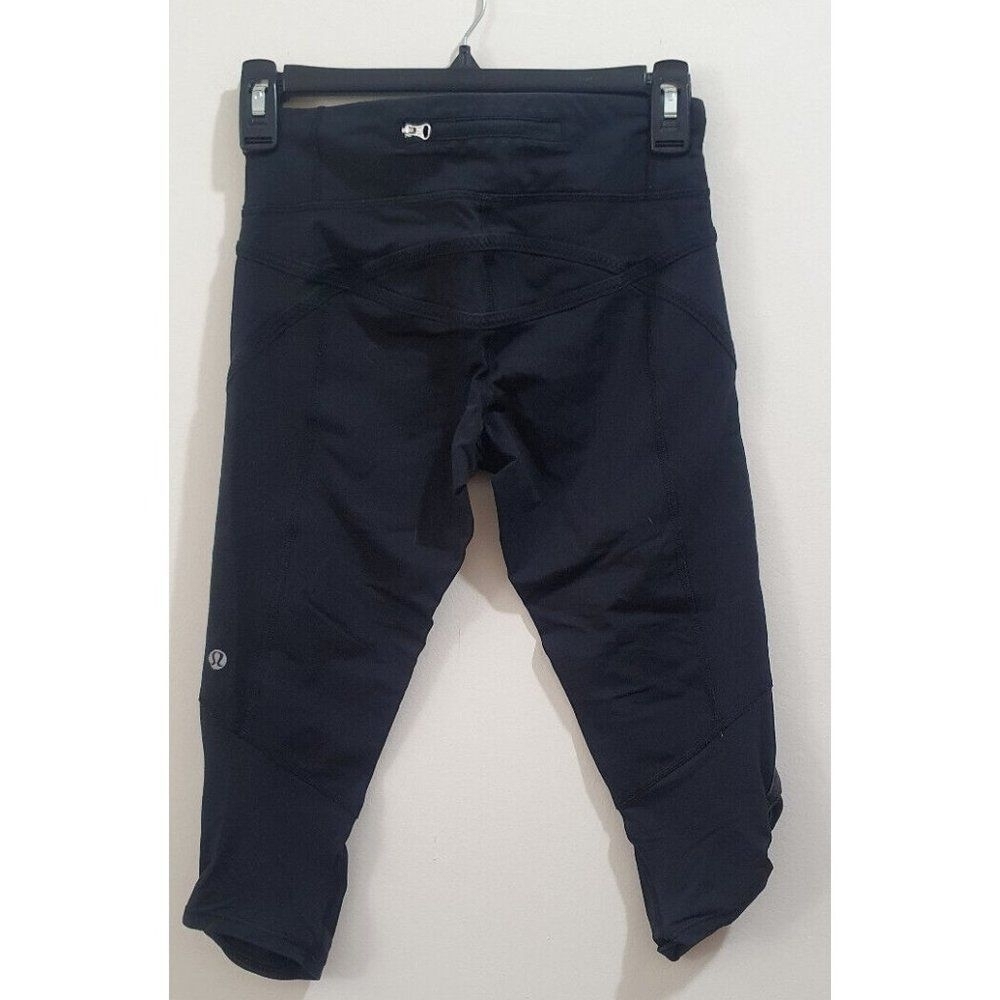 Lululemon Taryn Toomey Awakening Crop Leggings Size 4 Black Workout Active Yoga